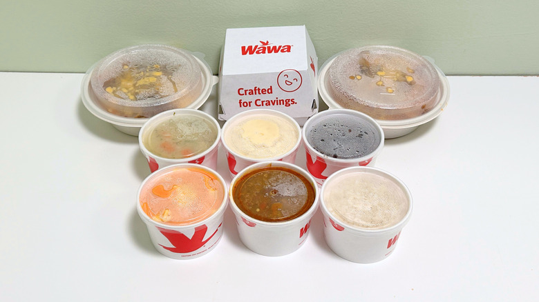 Several Wawa sides lined up together still in their to-go containers