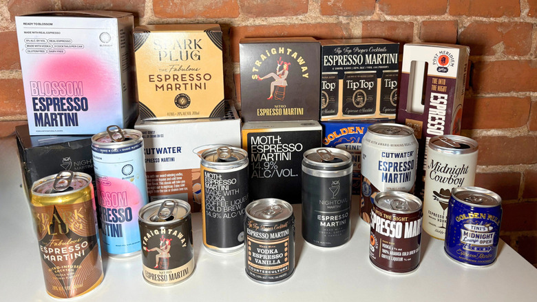 A pile of boxes and cans from a variety of Espresso Martini brands