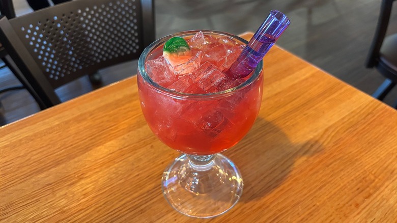 Applebee's Tipsy Reindeer with vibe shot and Santa gummy on wooden table