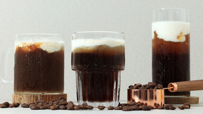 Three glasses of einspänner with coffee beans