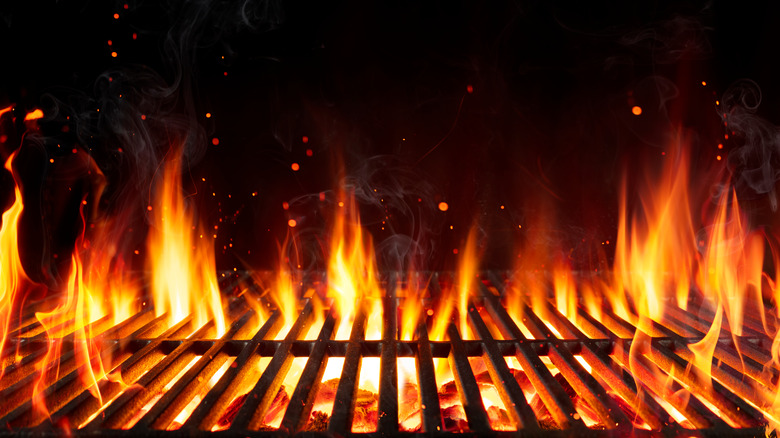 lit grill with flames