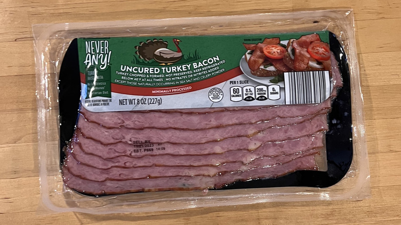 Unopened package of Never Any! brand turkey bacon.
