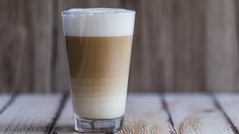 Caffe latte on wood table