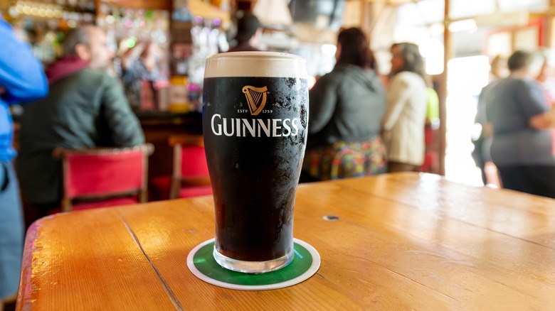 Glass of Guinness on a coaster