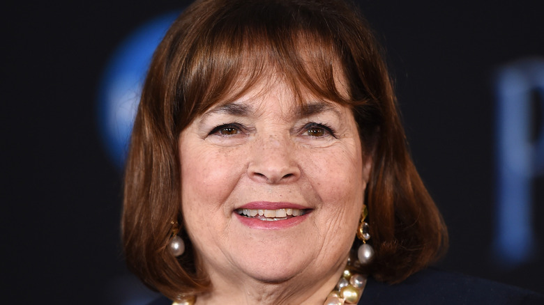 Ina Garten smiling with pearl earrings