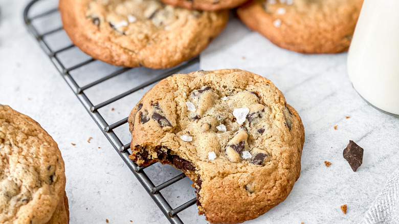 chocolate chip cookie with sea salt on cooling rack