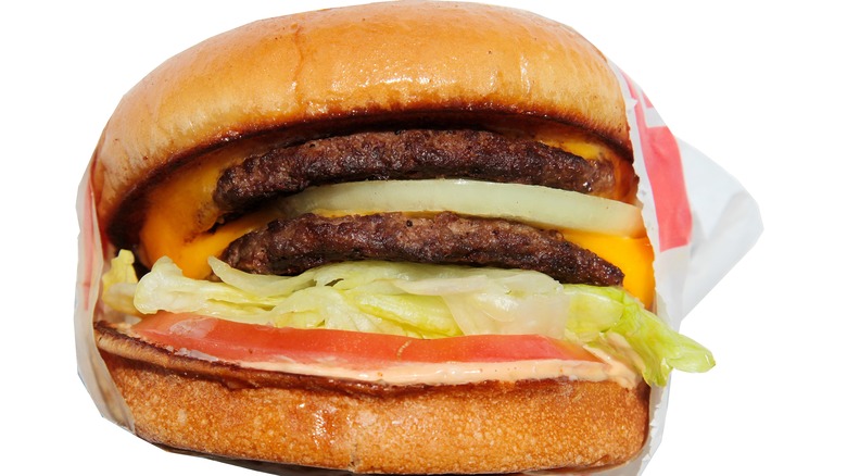 In-N-Out cheeseburger with raw onions
