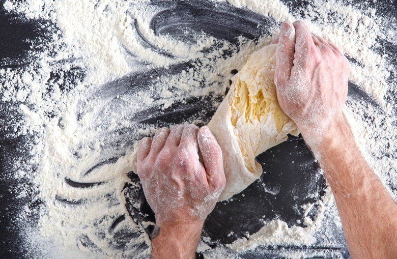 Dough is glutinous because it's sticky and glue-like.