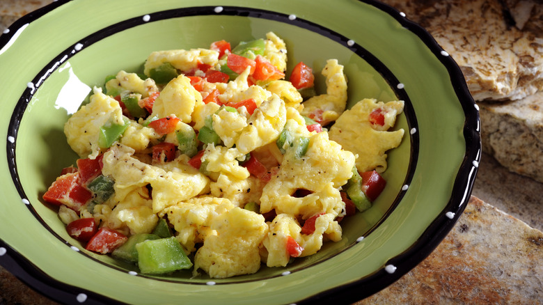 Scrambled eggs with veggies plated