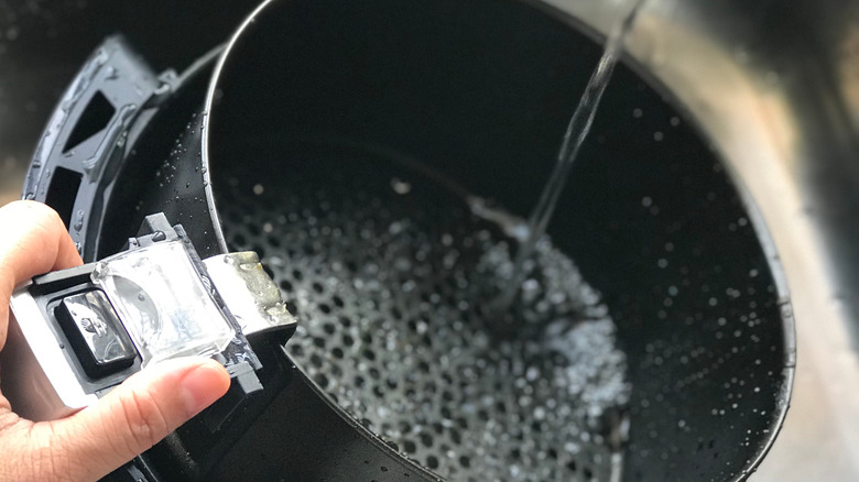 water running in air fryer