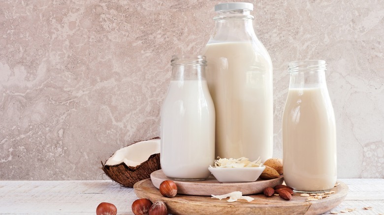 milk jugs wooden board