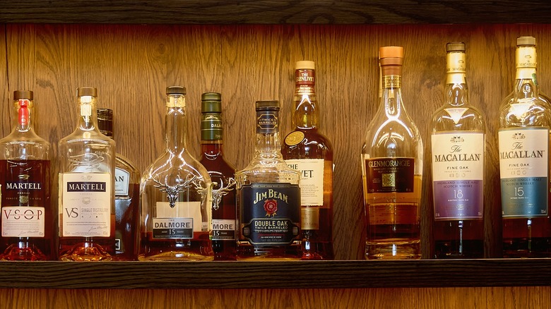 various whiskey bottles on shelf