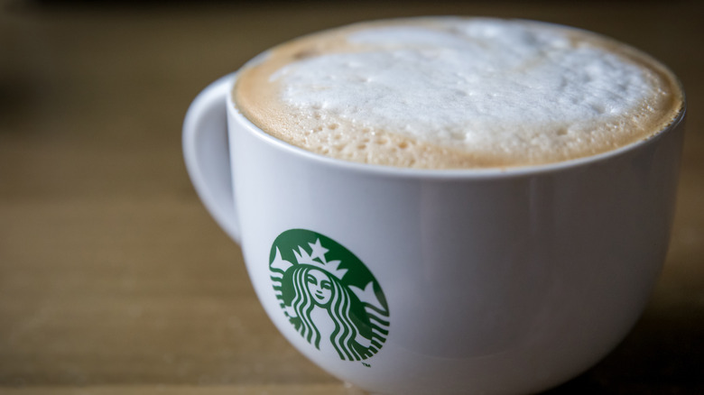 Starbucks cappuccino in ceramic logo mug