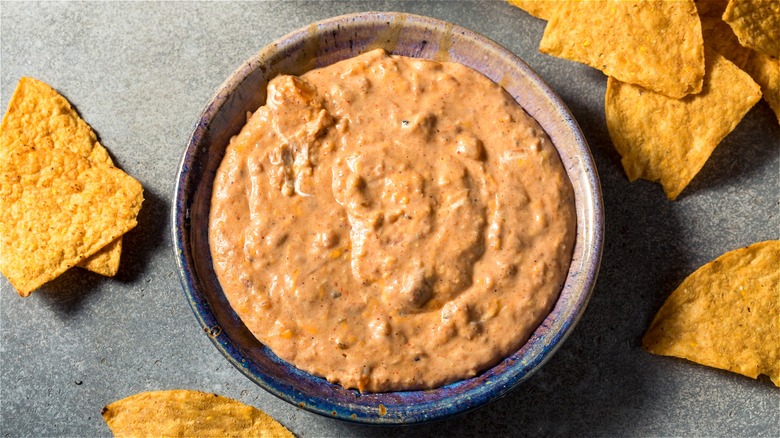 Bean dip in bowl with chips