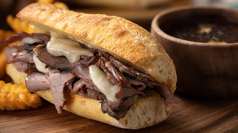 Close-up of a French dip sandwich served au jus
