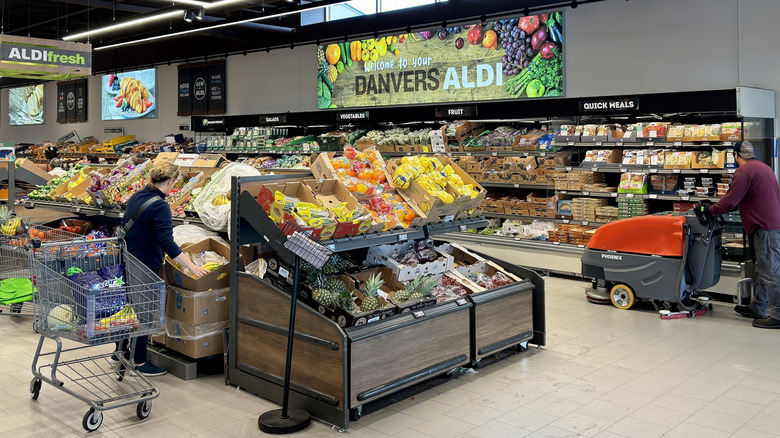 A selection of grocery items in a shopping cart