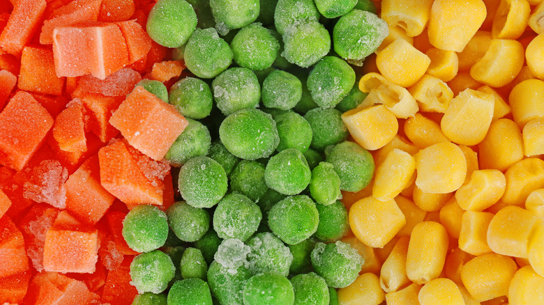 Colorful frozen carrots, peas, and corn