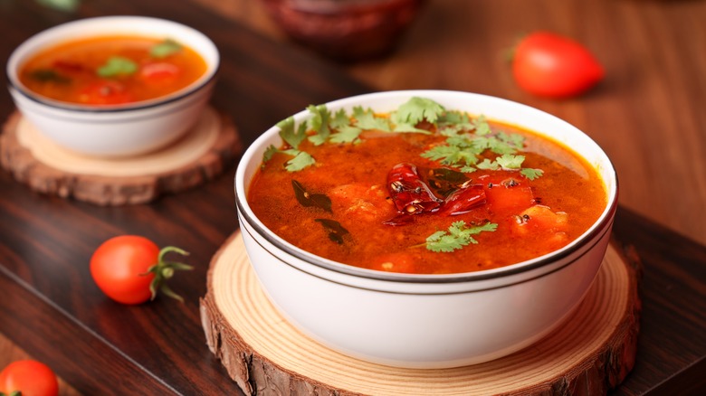 Bowl of tomato rasam curry
