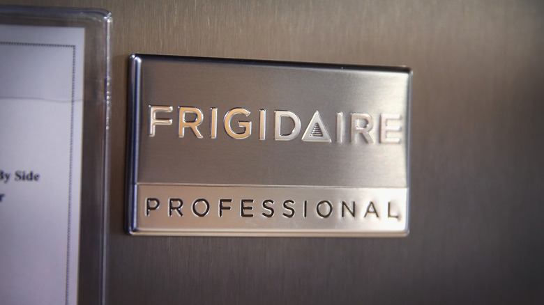 A Frigidaire Professional refrigerator logo on a fridge