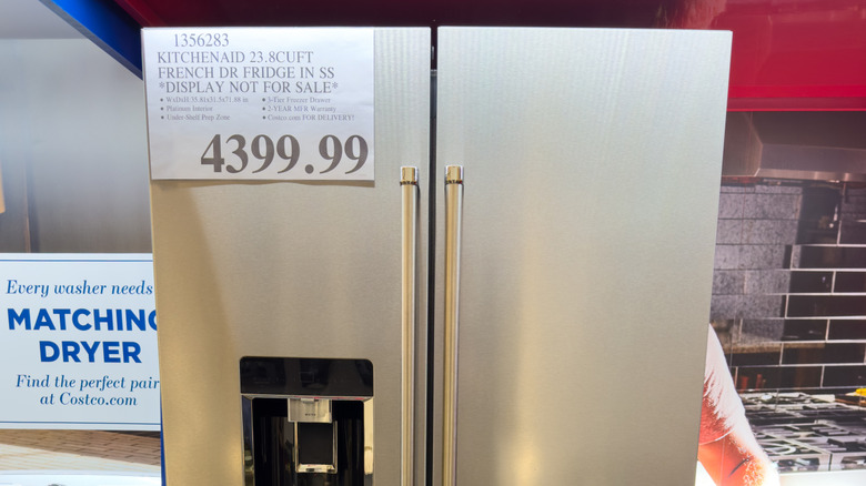 A KitchenAid refrigerator for sale in a Costco warehouse