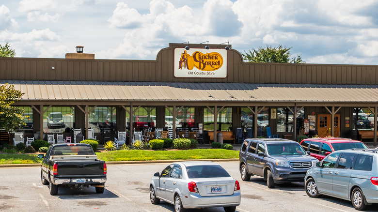 cars parked beside Cracker Barrel