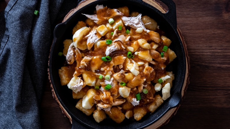 Tater tot poutine in cast iron skillet