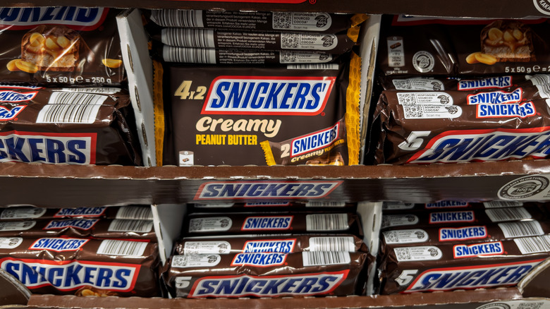 Shelves of Snickers bars