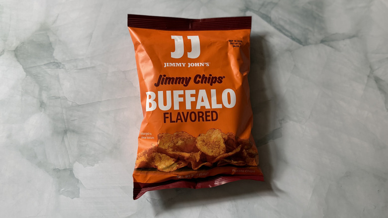 An orange bag of Jimmy John's Buffalo flavored Jimmy Chips