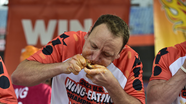 Joey Chestnut eating chicken wings
