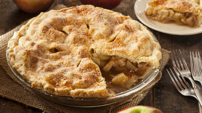 Apple pie with slice cut out