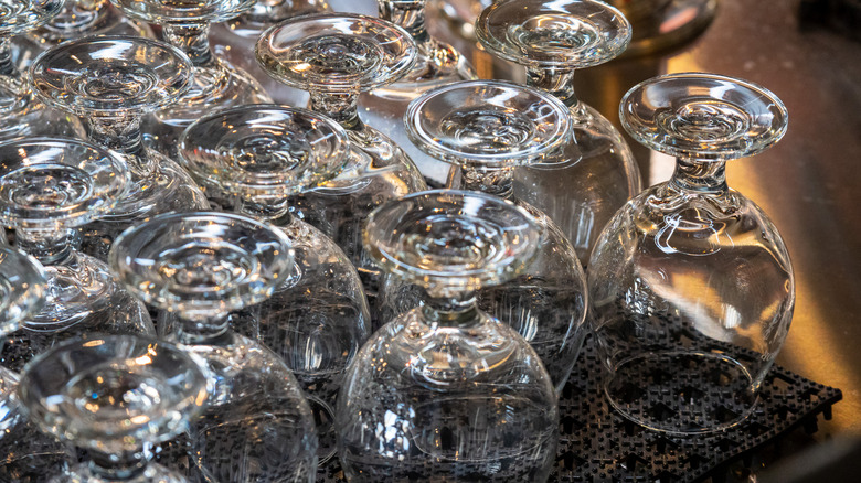 Clean glasses arranged on a bar mat