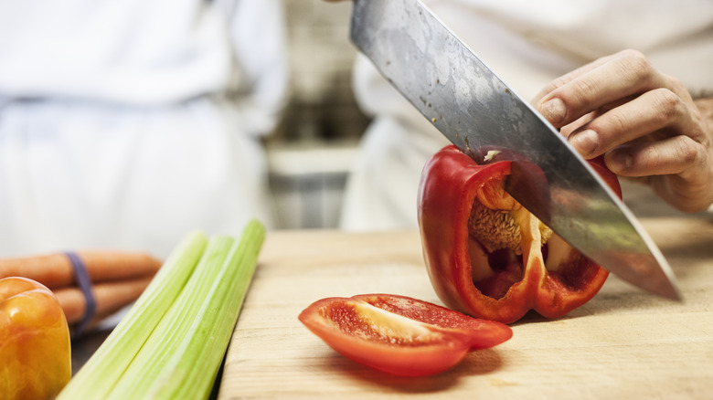 Chopping a red pepper