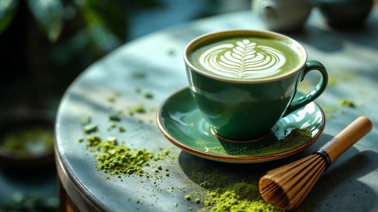 Matcha latte art in a ceramic cup.