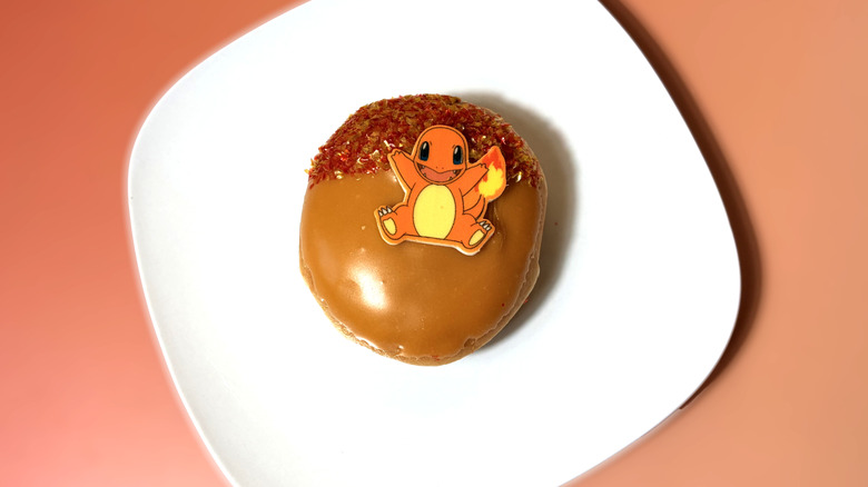 charmander themed shell doughnut on plate