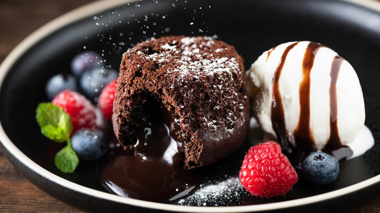 chocolate lava cake with berries and ice cream