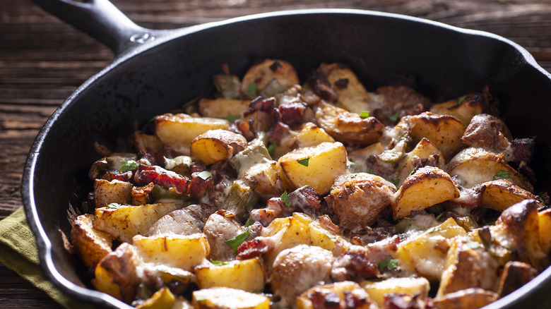meat and potatoes in cast iron