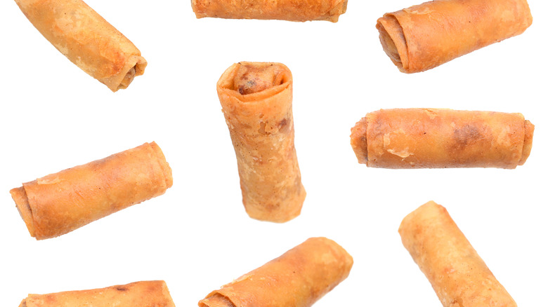 fried egg rolls on white background