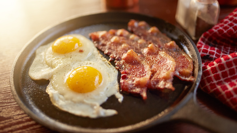 Bacon and eggs in skillet