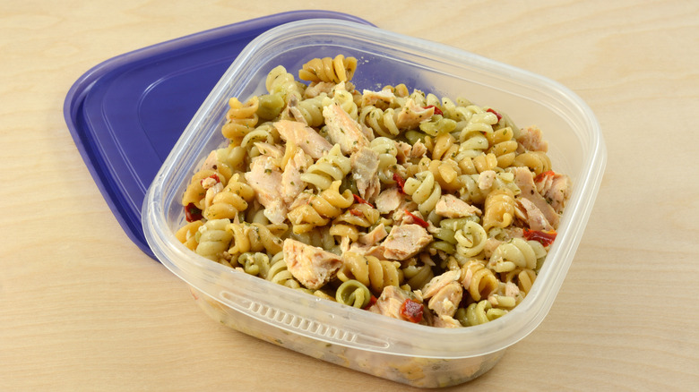 container of leftover pasta and chicken