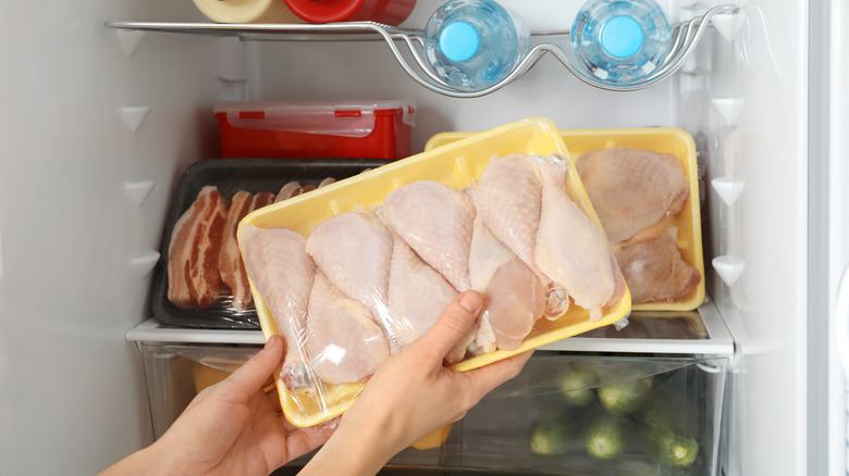 raw chicken in fridge