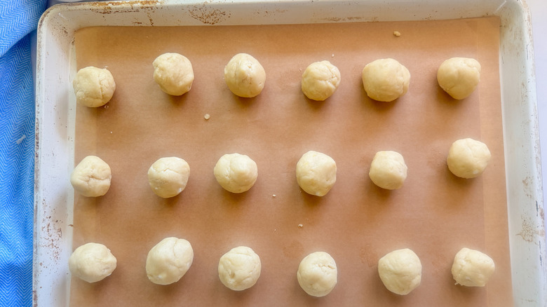 dough balls on baking sheet