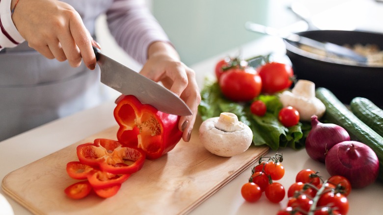 Person chopping vegetables
