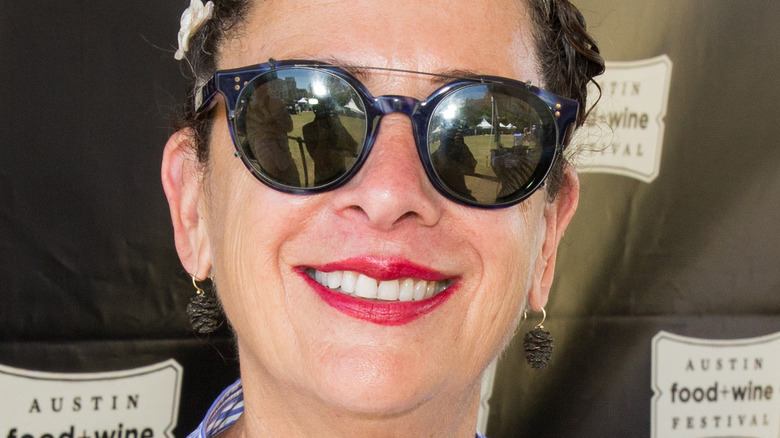 Nancy Silverton posing with her cookbook