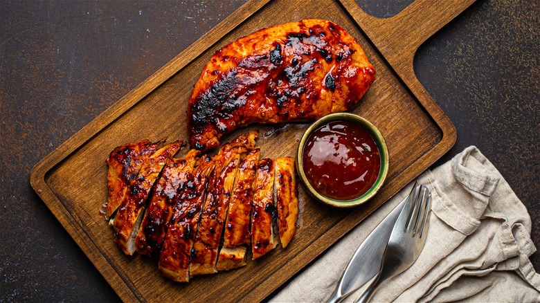 Barbecue chicken on cutting board