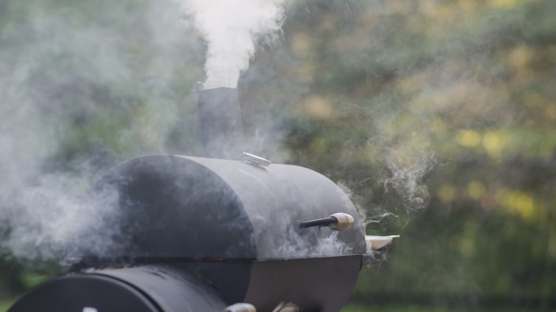 smoke from a barrel smoker