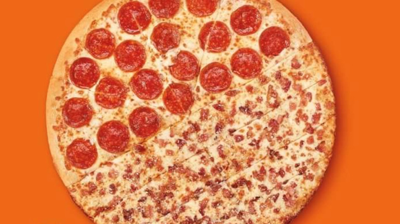 A slices n stix pizza on an orange background