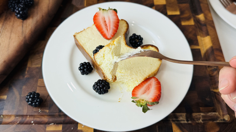 Forkful of loaf pan Basque cheesecake