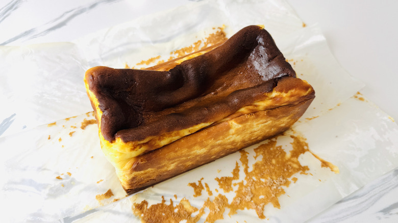 Removing parchment from loaf pan Basque cheesecake