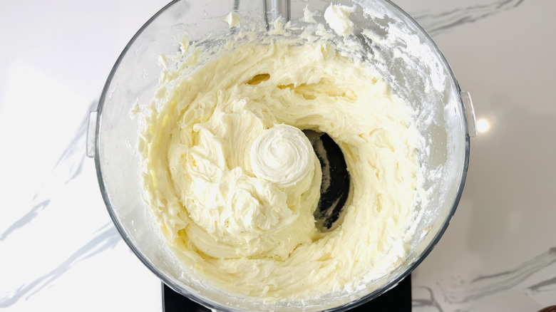 Cream cheese and sugar in food processor