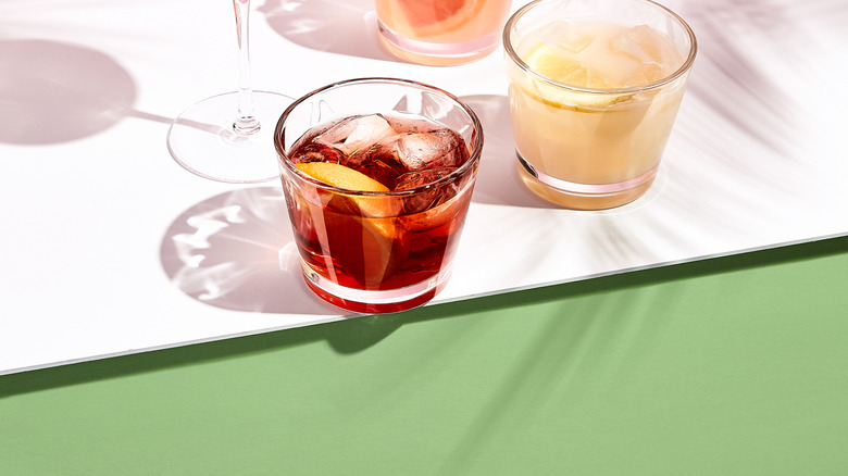 assorted cocktails with garnishes